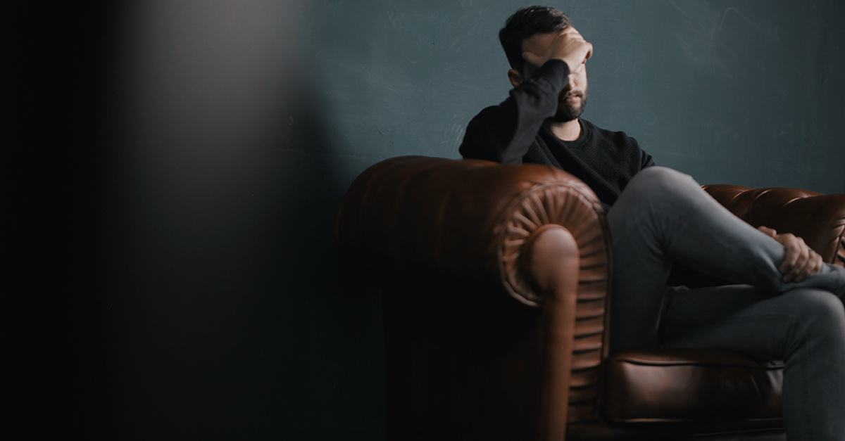 Stressed guy in chair
