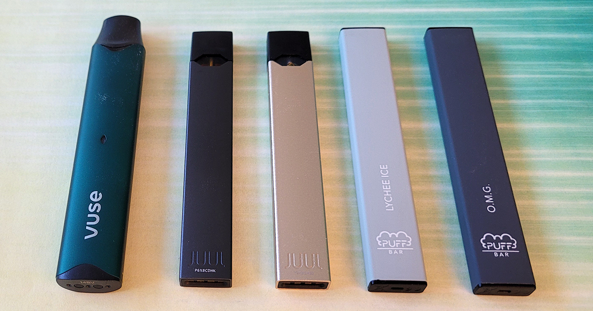 Line up of a Vuse, JUUL, and Puff Bar