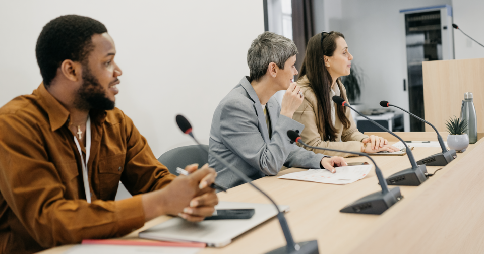 People attending a hearing at the local government level