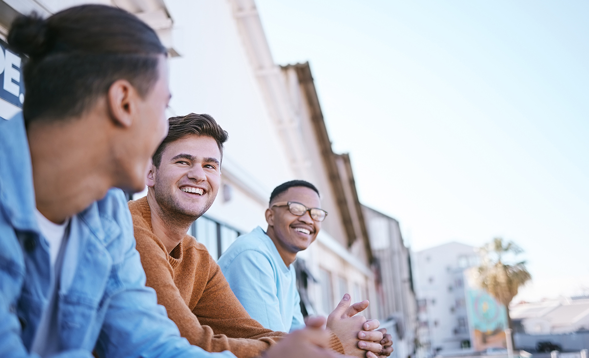 Young adults smiling and talking