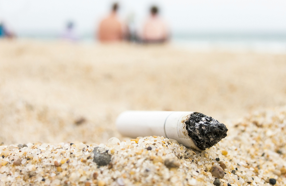 Cigarette butt on the beach