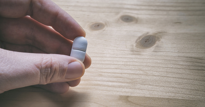 opioid pill hand table