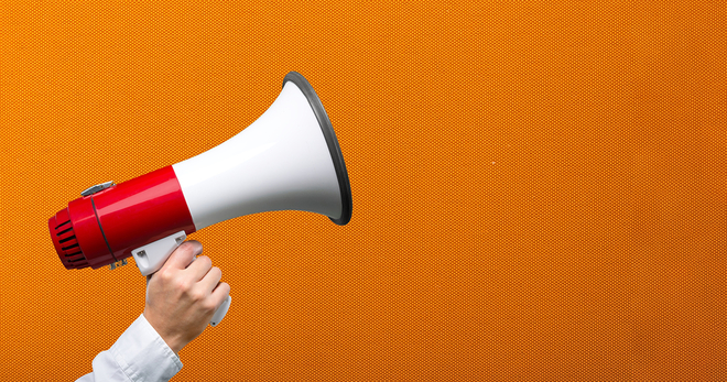 Picture of a megaphone on an orange background