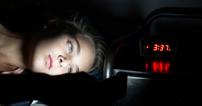 Teen up late at night on their phone
