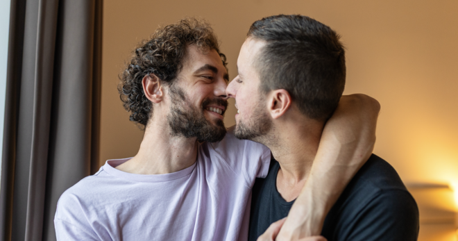 Two men embracing