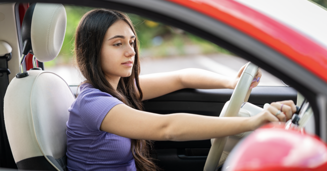 Teen girl driving
